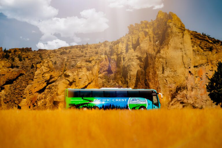 Pacific Crest Charter Bus taking passengers to parking lot at Smith Rock State Park