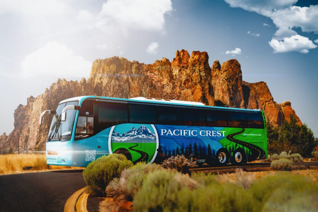 PCBL Bus in front of Smith Rocks on a Sunny Day
